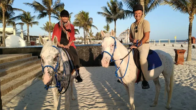 Horse riders on Hawana Salalah beach
