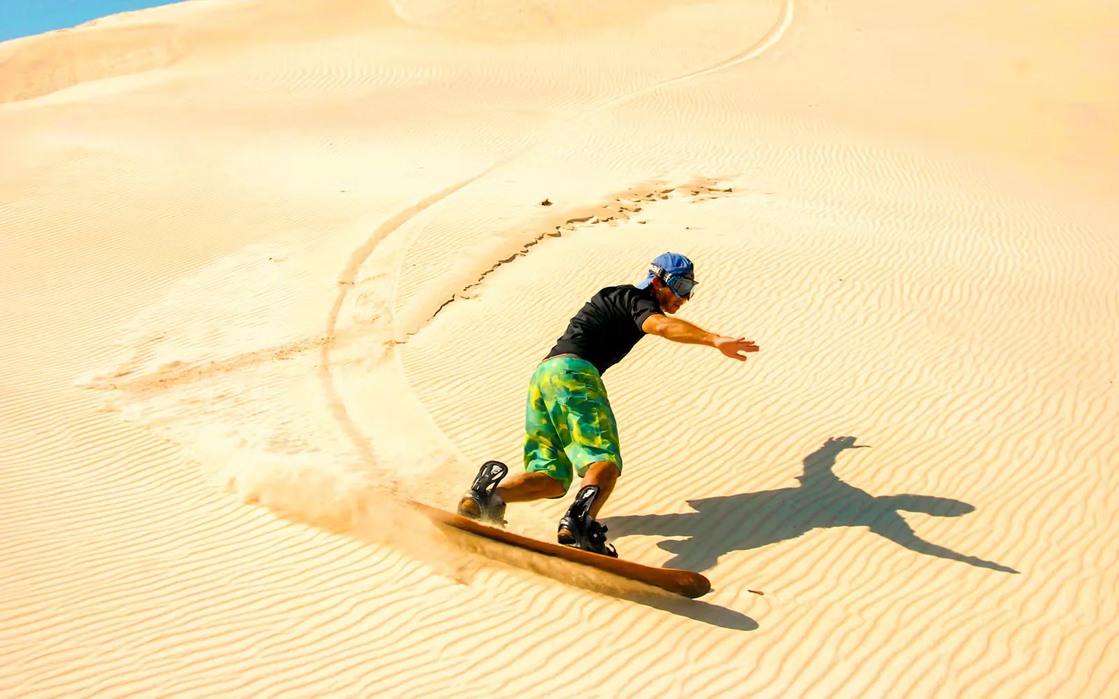 Morgensafari mit Kamelaktivität und Sandboarding – Aufnahme zum Erlebnis