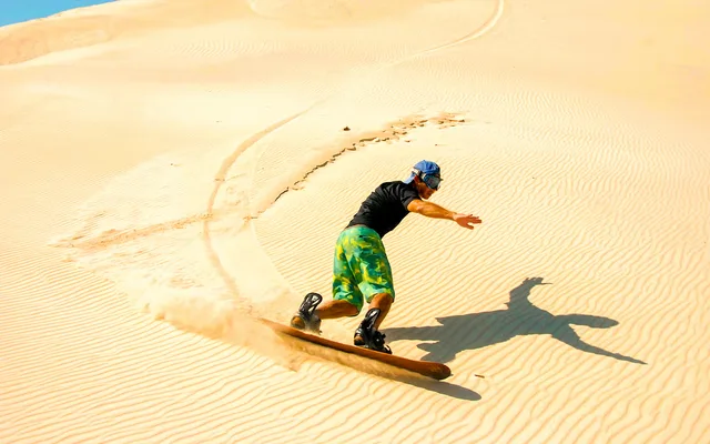 Morning Desert Safari Ras Al Khaimah with Camel & Sandboarding experience in Ras Al-Khaimah